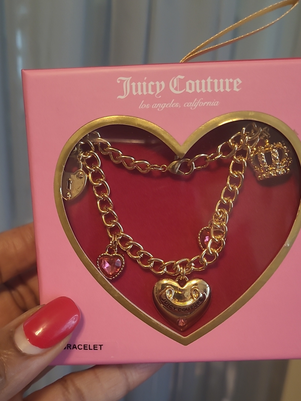 Juicy Couture Gold-Tone Charm Bracelet with Pink Gem Hearts